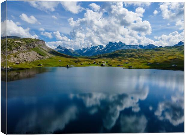 Beautiful Melchsee mountain lake in the Swiss Alps Canvas Print by Erik Lattwein
