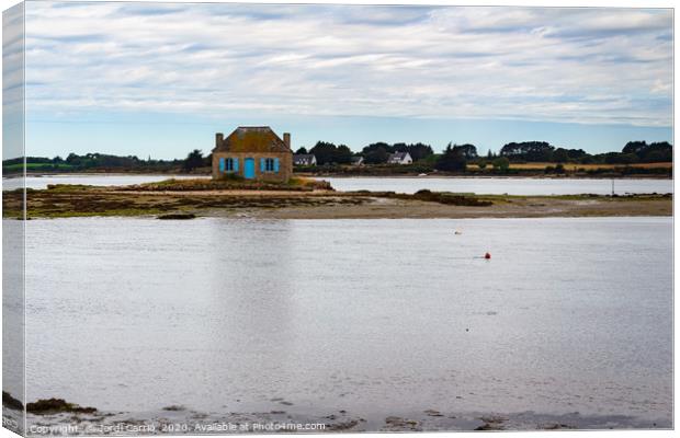 Breton house in the middle of the sea at low tide Canvas Print by Jordi Carrio