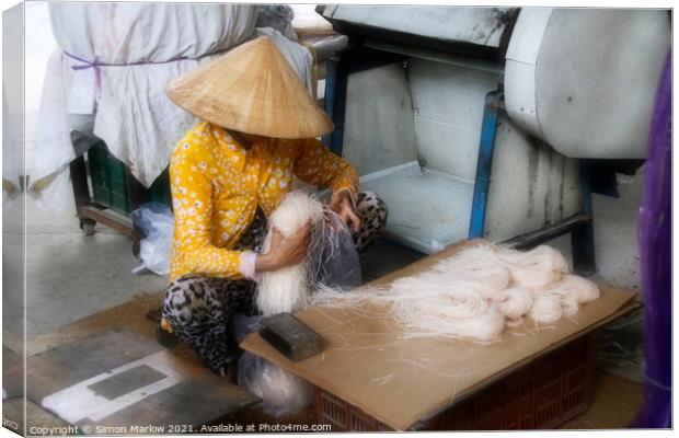 Mastering the Art of Rice Noodle Making Canvas Print by Simon Marlow
