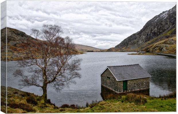 The cabin on the lake at Ogwen Canvas Print by Simon Marlow
