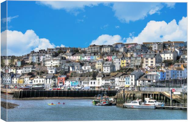 The colourful houses of Brixham in Devon Canvas Print by Simon Marlow