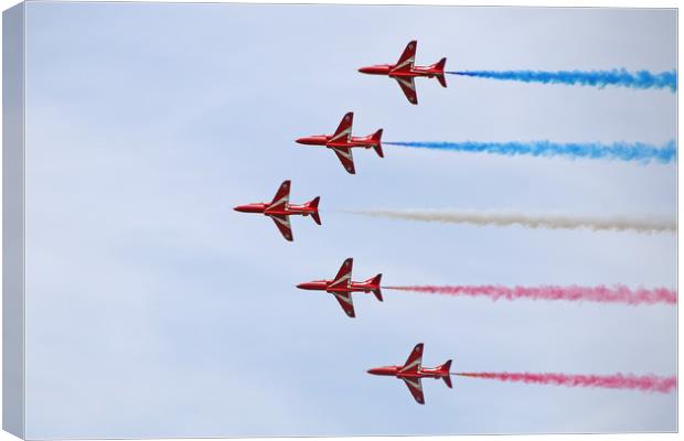 The Red Arrows in formation Canvas Print by Simon Marlow