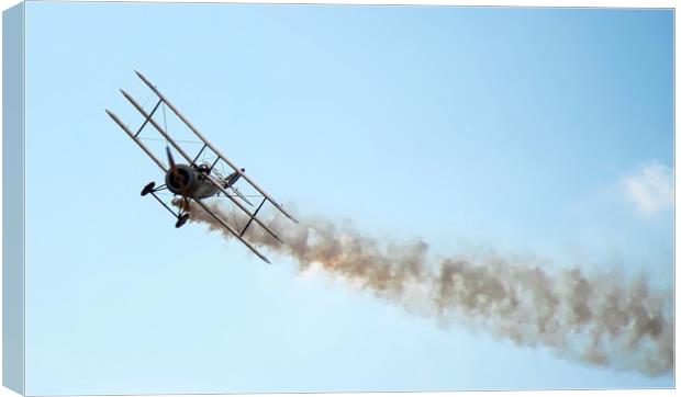 Sopwith Triplane flying with smoke behind Canvas Print by Simon Marlow