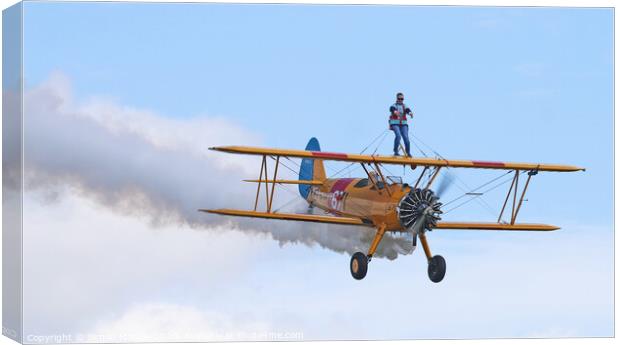 Wing Walking on a classic plane Canvas Print by Simon Marlow