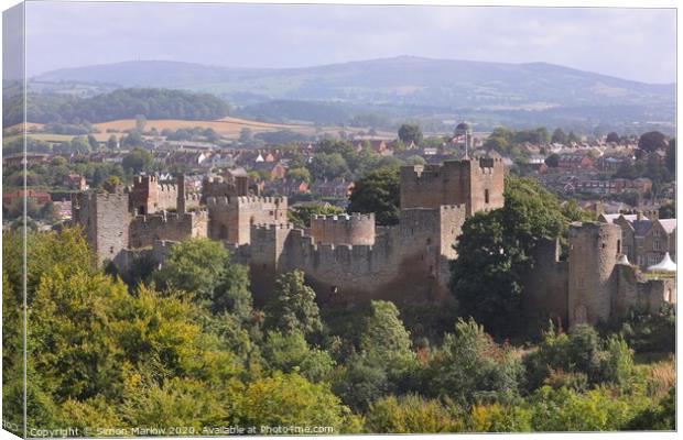 A view looking down on Ludlow Castle Canvas Print by Simon Marlow