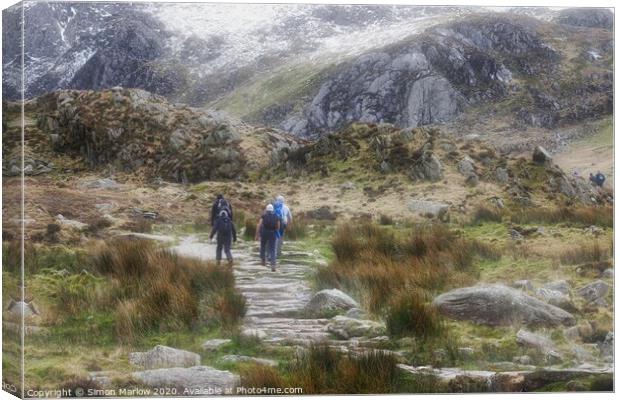 Hiking at Llyn Idwal in Snowdonia National Park, W Canvas Print by Simon Marlow