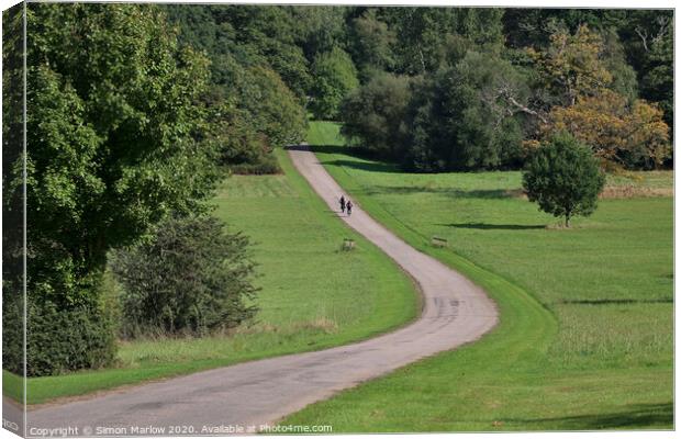 Serene Cycling in Windsor Great Park Canvas Print by Simon Marlow
