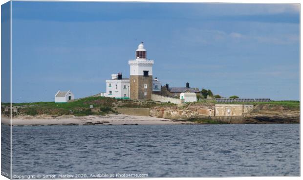 The lighthouse on Amble Island, Northumberland Canvas Print by Simon Marlow