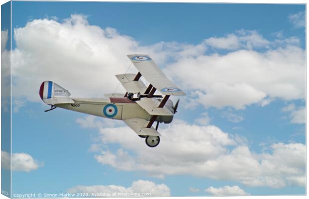 Sopwith Triplane flying past at White Waltham Canvas Print by Simon Marlow