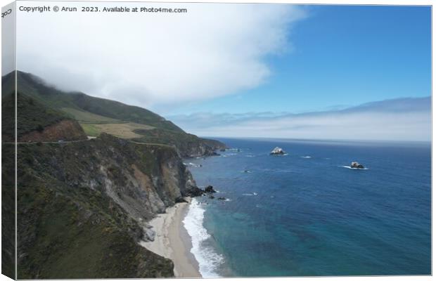 Windswept cliffs and Pacific ocean from Highway one Calfifornia Canvas Print by Arun 