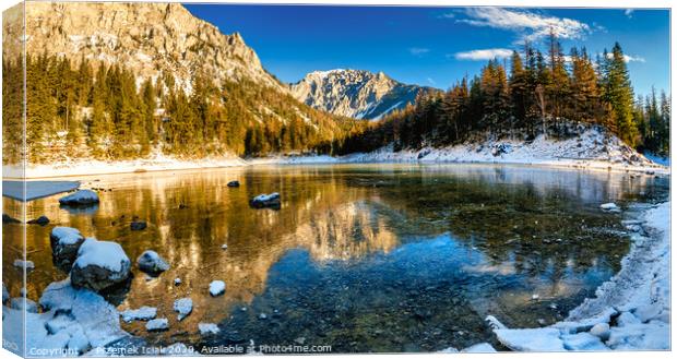 Peaceful mountain panorama view with famous green lake in Austria Styria. Tourist destination lake Gruner See in winter. Canvas Print by Przemek Iciak
