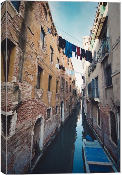 clothes hanging in the canal with gondolas, Venice Canvas Print by federico stevanin