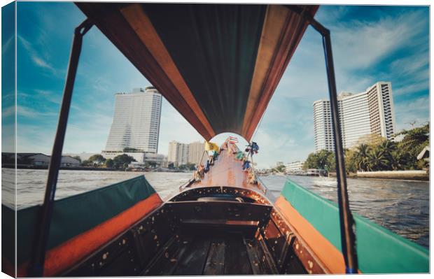 long tail boat on Chao Phraya river in Bangkok Canvas Print by federico stevanin