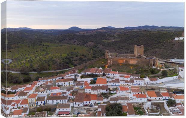 Mertola drone aerial view of the city and landscape with Guadiana river and medieval historic castle on the top in Alentejo, Portugal Canvas Print by Luis Pina