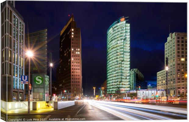 Potsdamerplatz plaza in Berlin at night with light trails Canvas Print by Luis Pina