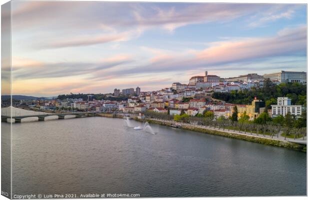 Coimbra drone aerial city view at sunset with Mondego river and beautiful historic buildings, in Portugal Canvas Print by Luis Pina