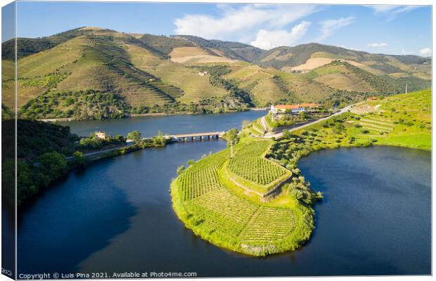 Douro wine valley region drone aerial view of s shape bend river in Quinta do Tedo at sunset, in Portugal Canvas Print by Luis Pina
