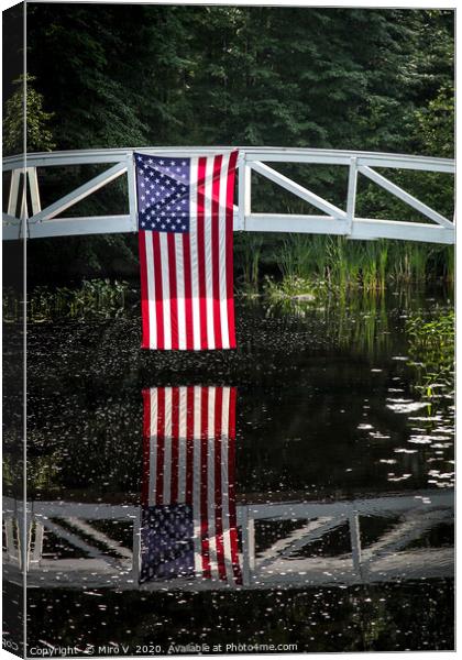 American flag hanging from wooden bridge in Somesv Canvas Print by Miro V