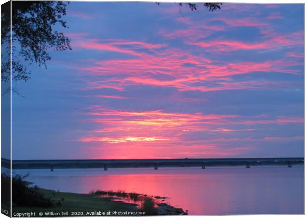 Sunset sky over Lake Texoma Bridge Canvas Print by William Jell