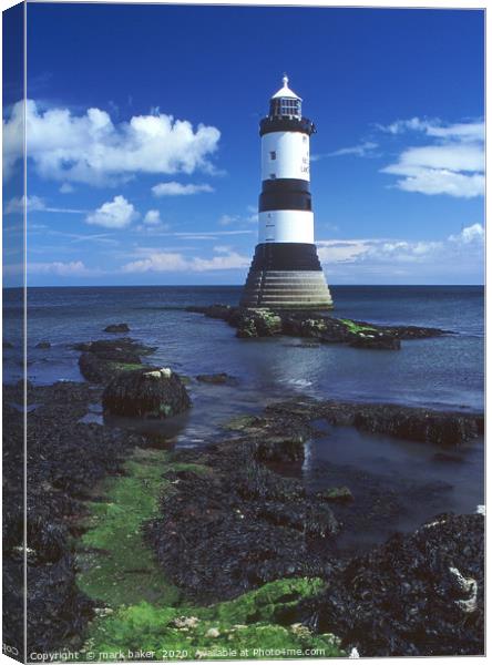 lighthouse at Penmon Point. Canvas Print by mark baker