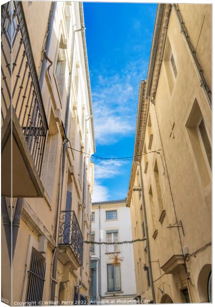 Apartments Balconies Christmas Decorations Narrow Street Nimes G Canvas Print by William Perry