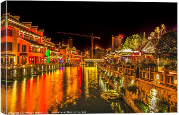 Water Canal Night Illuminated Wuxi Jiangsu China Canvas Print by William Perry