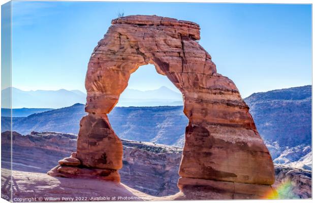 Delicate Arch Rainbow Rock Canyon Arches National  Canvas Print by William Perry