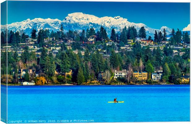 Yellow Canoe Houses Lake Snow Capped Mountains Bel Canvas Print by William Perry