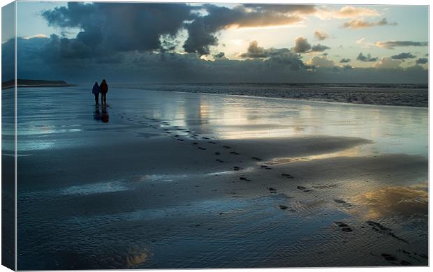 Foot prints in the sand Canvas Print by Wayne Molyneux