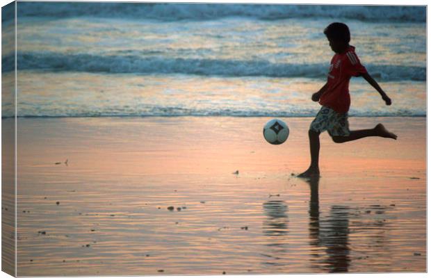 Kid playing in Goa beach Canvas Print by Arpan Bhatia