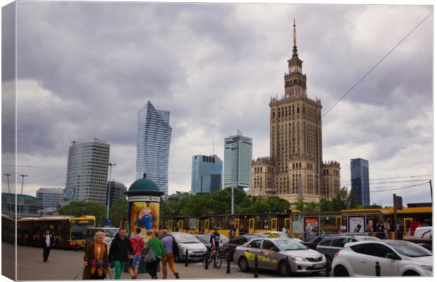 Warsaw, Poland - June 01, 2017: Cityscape showing people and traffic against Palace of Culture and sciences one of the main travel attractions, symbol of Warsaw city located in central Europe Canvas Print by Arpan Bhatia
