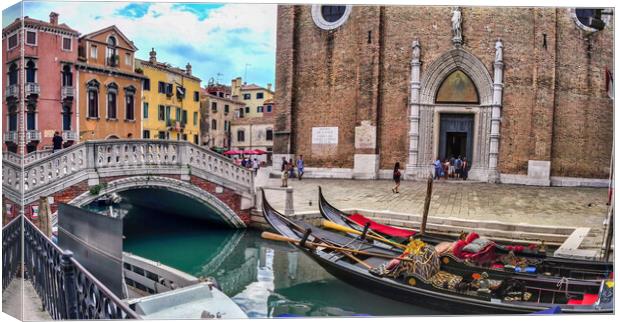Venice, Italy -Wide angle panorama shot of venzia bridge over canal next to gandola boats against church Canvas Print by Arpan Bhatia