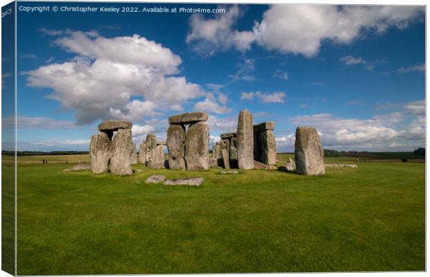 Blue skies over Stonehenge Canvas Print by Christopher Keeley