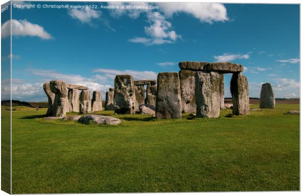 A sunny day at Stonehenge Canvas Print by Christopher Keeley