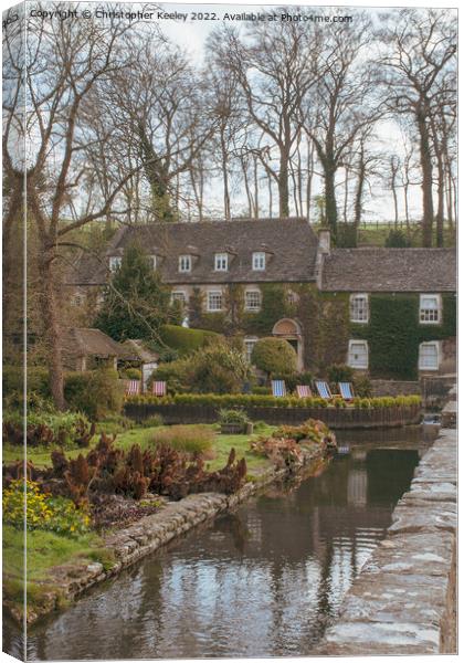 Bibury in the Cotswolds Canvas Print by Christopher Keeley