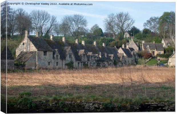Arlington Row cottages in the Cotswolds Canvas Print by Christopher Keeley