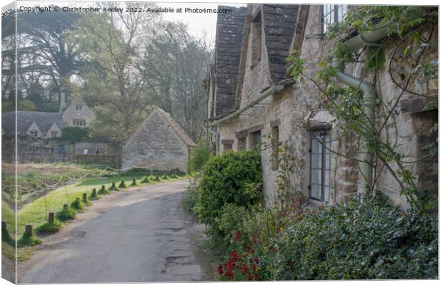 Cotswolds cottages at Arlington Row, Bibury Canvas Print by Christopher Keeley