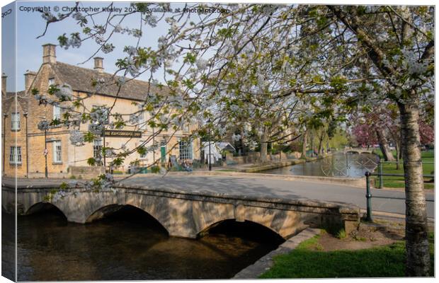 Spring in Bourton-on-the-Water Canvas Print by Christopher Keeley