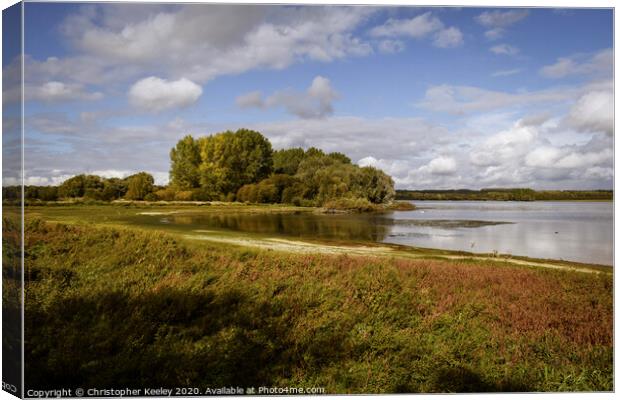 Rutland Water cloudy skies Canvas Print by Christopher Keeley
