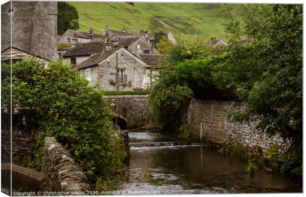 Castleton stream and cottages Canvas Print by Christopher Keeley