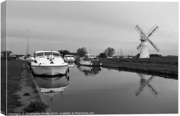 Thurne Mill and boats Canvas Print by Christopher Keeley