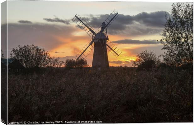 Norfolk windmill sunset Canvas Print by Christopher Keeley
