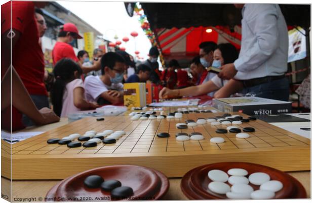 Chinese playing Go Game, Weiqi in a street. Canvas Print by Hanif Setiawan