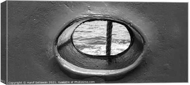Bull´s eye in a blue iron wall from a ship. 1bw Canvas Print by Hanif Setiawan