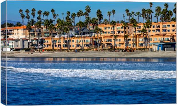 View from the pier on homes in Oceanside. Canvas Print by Mikhail Pogosov
