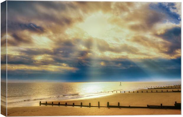 Stunning sun rays lighting up Frinton beach Canvas Print by Paula Tracy