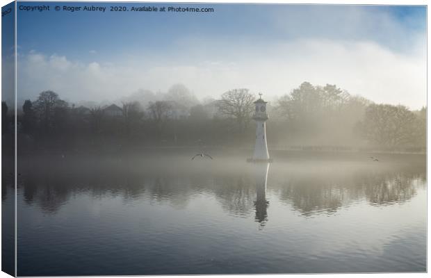 Mist on Roath Park Lake  Canvas Print by Roger Aubrey