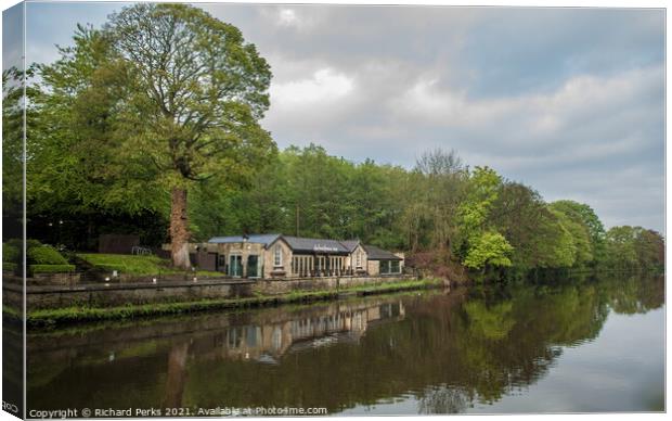 Reflections of the  Boathouse Inn Saltaire Canvas Print by Richard Perks