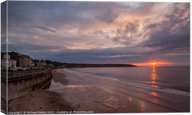 Storm Cloud Sunrise at Filey Beach Canvas Print by Richard Perks