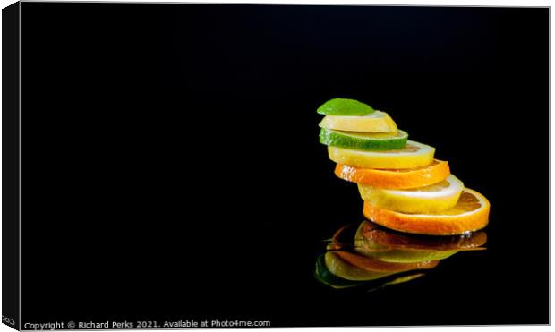 Orange and Lemon with a slice of Lime Canvas Print by Richard Perks